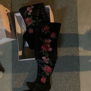 Tall lace up booths with flower detailing 4 1/2 inch heel worn twice